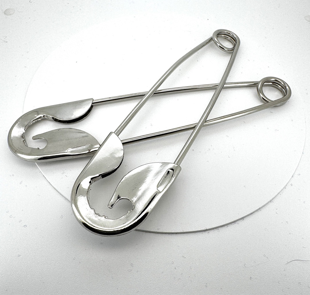 Détail d'une couture renforcée avec point de retour